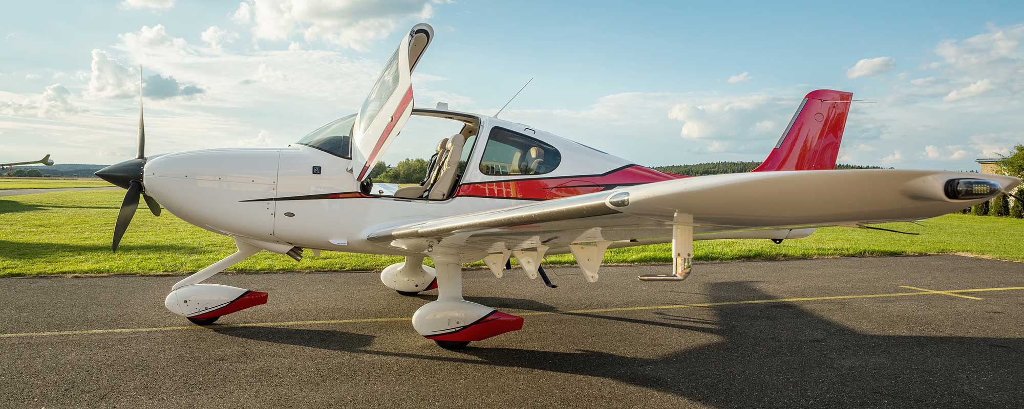 Red and White Plane With Propeller 